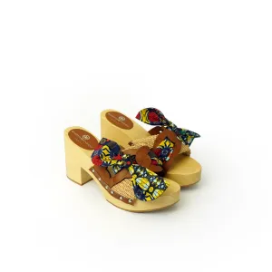 Diva Chain sandali in legno incrociato con platform in rafia e fiocco stamap african
