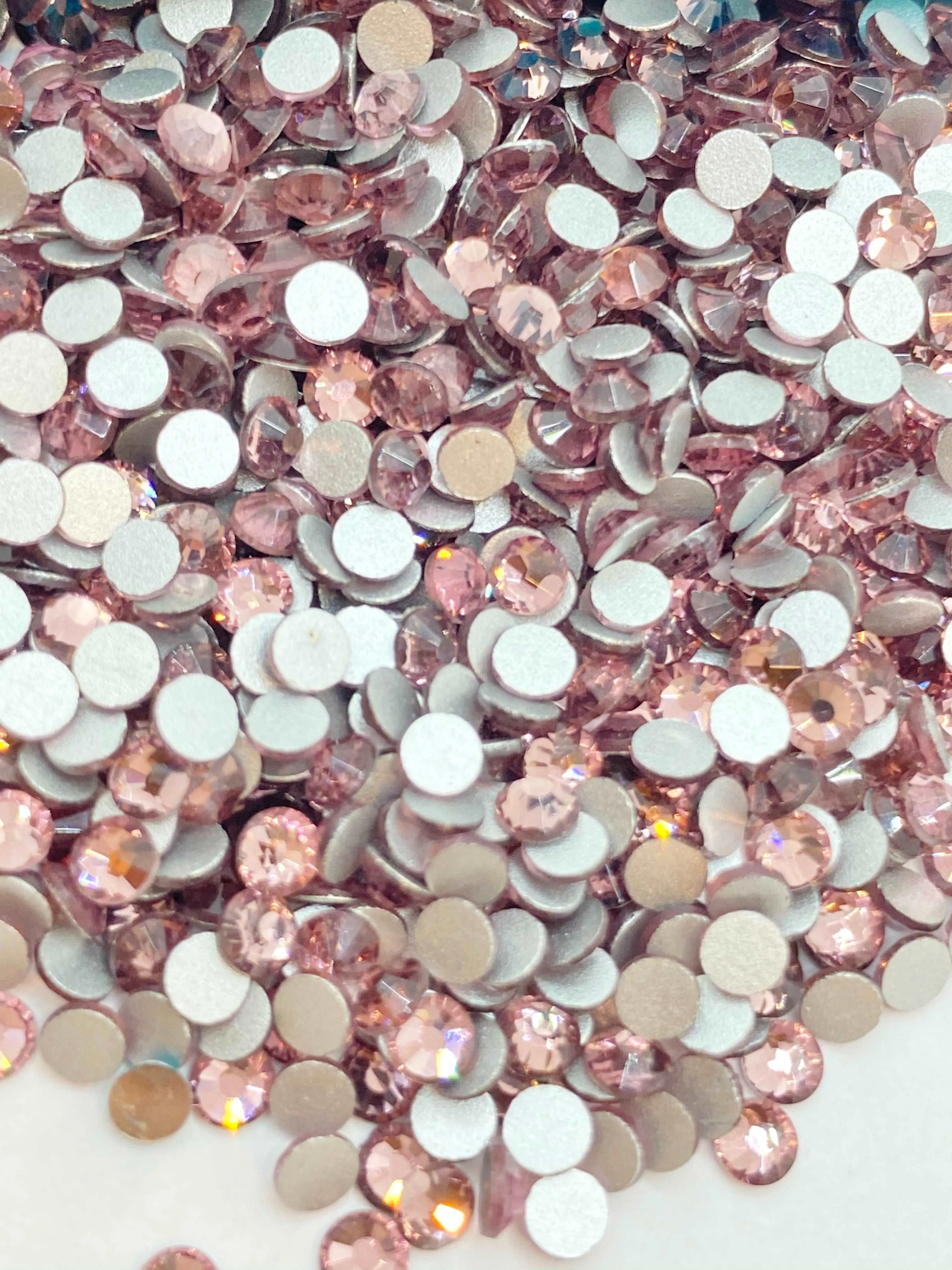 Light rose glass rhinestones ( light pink)