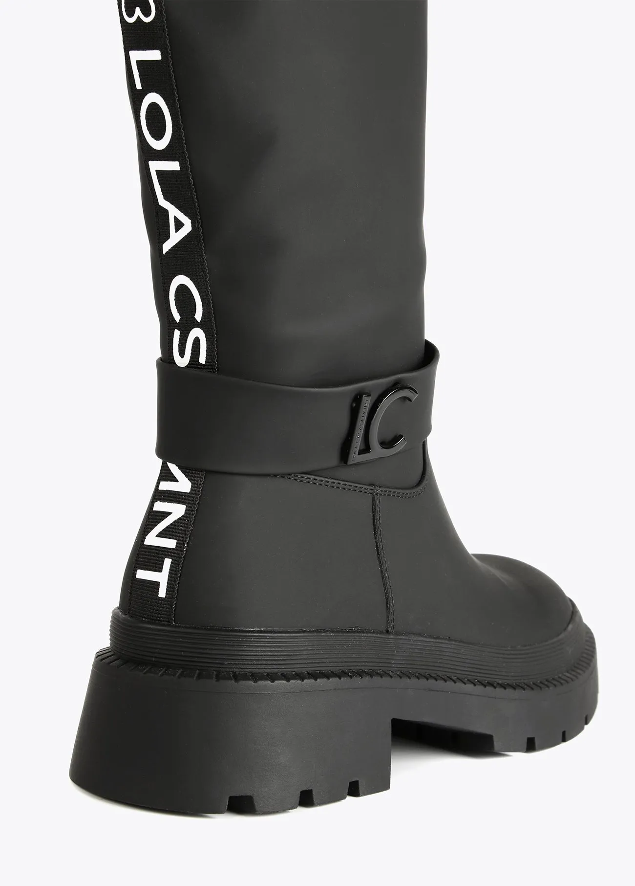 Rubberised knee-high boots